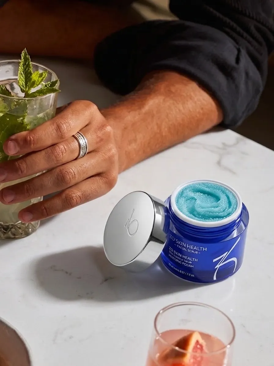 Skincare jar on a marble cafe table