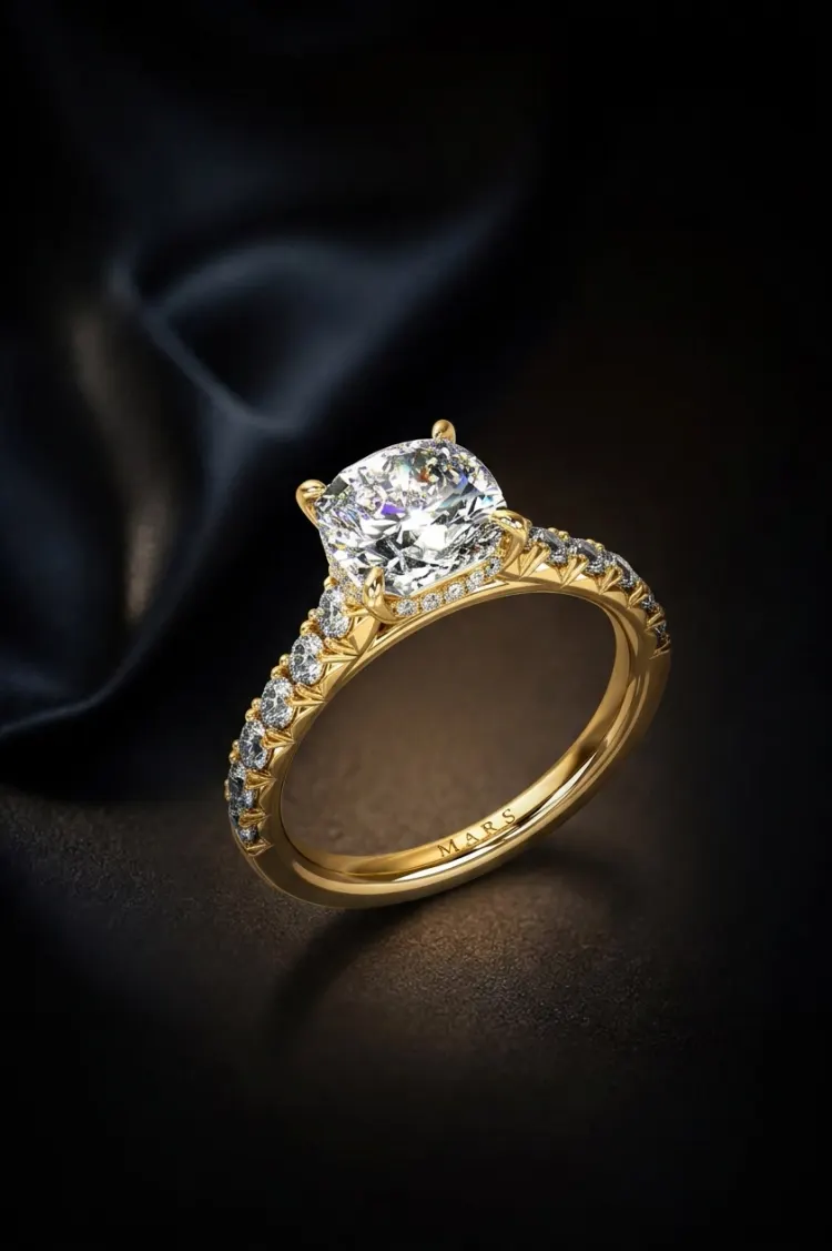 Gold diamond engagement ring on black silk